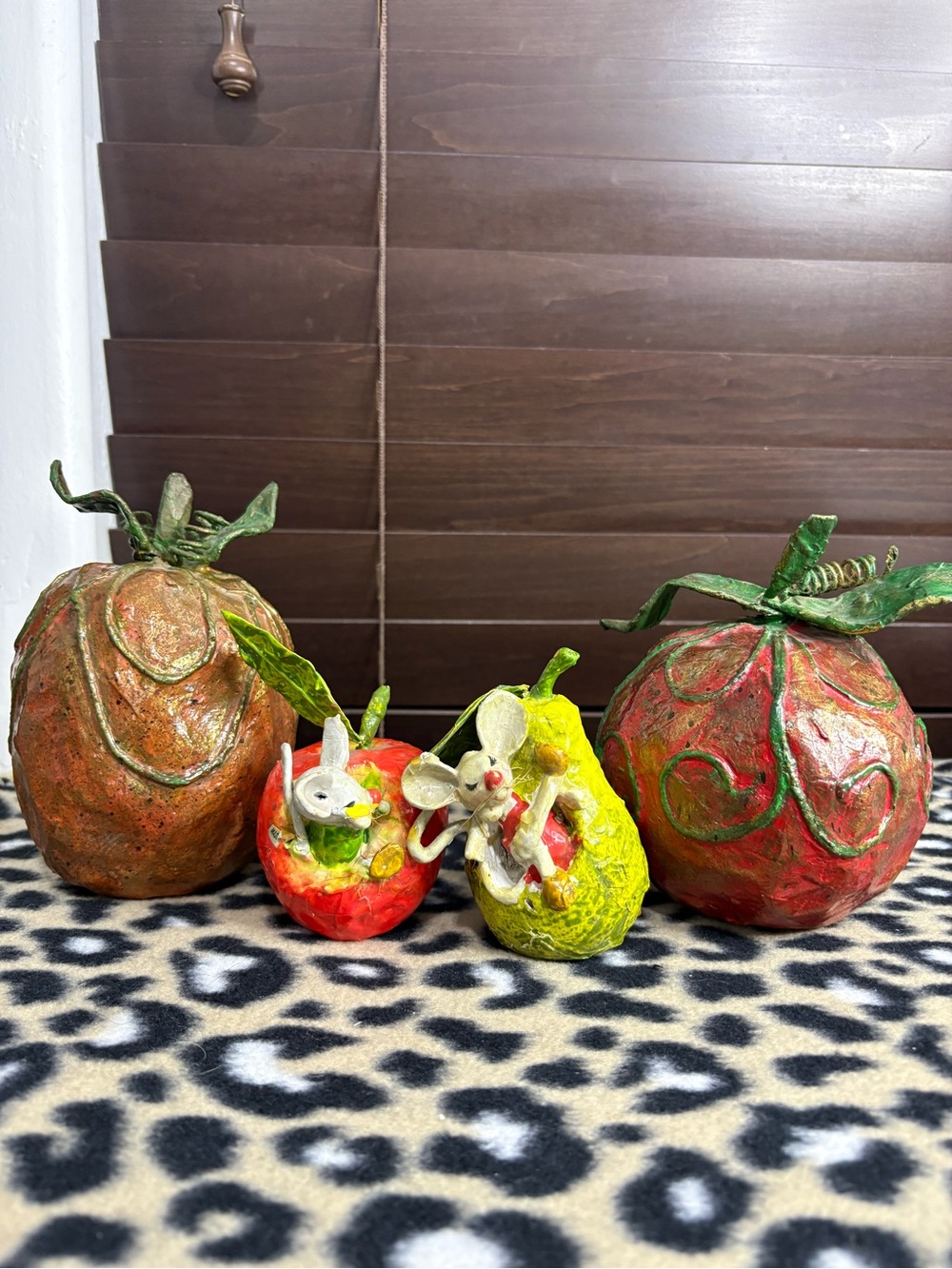 handcrafted, whimsical folk art figurines made from paper mache.